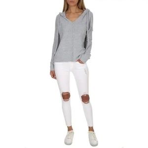 Frame le skinny de Jeanne blanc ripped Jean